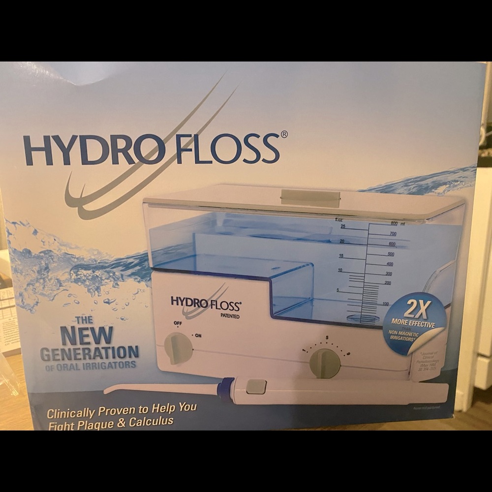 BRAND NEW UNUSED HydroFloss